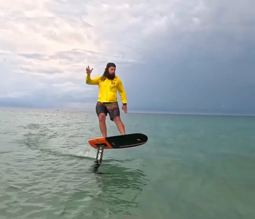 Chris Trappy, co-founder of Fin & Foil, riding a hydrofoil board